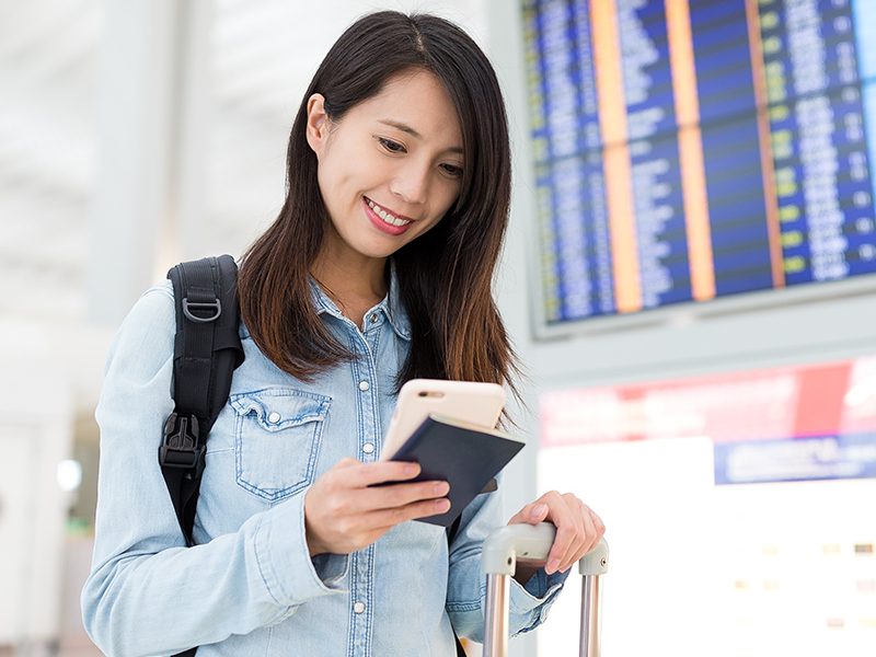 young-woman-using-cellphone-in-airport-KE9NFAMa.jpg young-woman-using-cellphone-in-airport-KE9NFAMa.jpg
